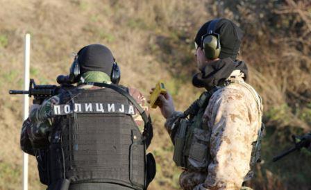 A U.S. Navy SEAL assigned to Naval Special Warfare Unit 2 trains up a member of the Serbian Special Anti-Terrorist Unit in November 2016. (photo by Staff Sgt. Larraine Whetstone, 24th Press Camp HQ).