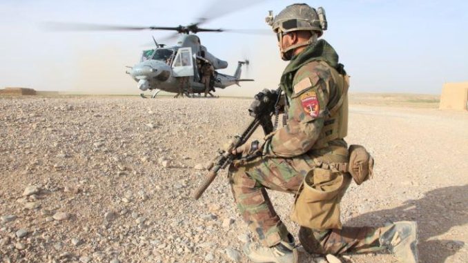 Task Force South West - MARSOC Marine from Special Operations Task Force West provides security at LZ in Nahr-e-Saraj district, Helmand province. (Photo by Cpl. Kyle McNally, 28 Mar 2012).