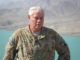 John Friberg at Sarobi Lake, Afghanistan while visiting a French brigade in July 2012 while serving as a Counterinsurgency Advisor assigned to the COMISAF Advisory and Assistance Team (CAAT).