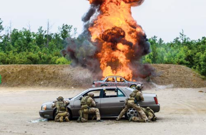 Special Operations Soldiers fire upon an enemy vehicle during a capabilities exercise on Fort Bragg, NC (Photo by USSOCOM, Tip of the Spear, June, 2017)