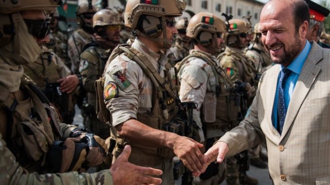 Members of Afghanistan's CRU 222 are congratulated by Minister of Interior for their part in defeating an ISIS attempt to take over the Iraq Embassy in Kabul on 31 August 2017. (Resolute Support photo).