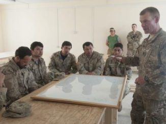 RAND SFA Paper - SFAAT Adviser from 4 BCT 3rd ID deployed in Logar province, Afghanistan provides instruction on C-IED to ANCOP (Photo by SGT Julieanne Morse, US Army).