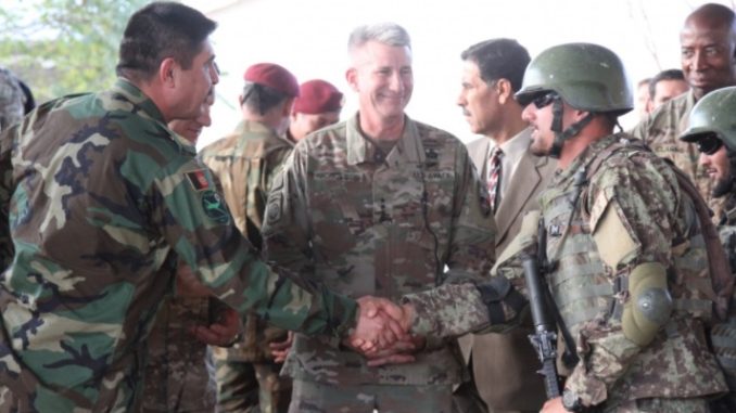 20171023 - MG Bismellah Waziri, Afghan National Army Special Operations Command commander,, congratulates the Commando Qualification Course student company commander on his mission brief to ANASOC and NATO Resolute Support leadership at Camp Commando, Kabul on Oct. 21, 2017. (Photo Jacob Krone, NSOCC-A).