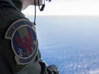1st SOS crew member looks out over the crash site of STRAY 59 - a MC-130E that crashed 37 years ago. (photo SSgt Matthew Fredericks, 18th Wing Public Affairs, Feb 26, 2018).