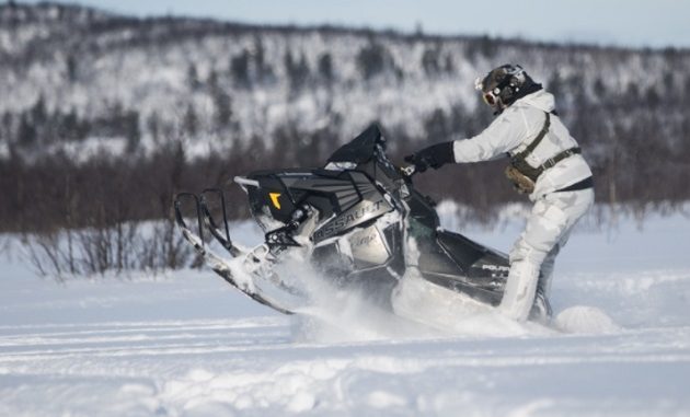 10th Special Forces member on a snow machine during a four week long winter warfare training exercise in Sweden. (photo by SSG Matthew Britton, SOCEUR, February 28, 20180.