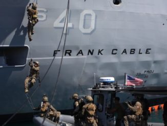 Marines from Force Recon company board a ship in Guam. (Photo by CPL Carl King, 3rd Marine Division, March 21, 2018).