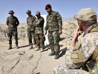 Latvian SOF is briefed by an Afghan officer assigned to a Mobile Strike Kandak during the Cobra Strike Maneuver Course near Kabul. Photo by MSG Felix Figueroa, NSOCC-A, Sep 2018.
