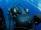 SEALs prepare to launch Swimmer Delivery Vehicle (SDV) from the back of the USS Philadelphia. The SDVs are used to carry Navy SEALs from a submerged submarine to enemy targets while staying underwater and undetected. U.S. Navy photo by Chief Photographer's Mate Andrew McKaskle, May 5, 2005.
