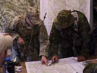 Saber Junction 18 - KASP and 20th SFGA personnel conduct mission planning. Photo by 1st Lt Benjamin Haulenbeek; SOCEUR, Sep 19, 2018.