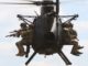 Rangers fly on Little Bird helicopter. USASOC photo (2018).