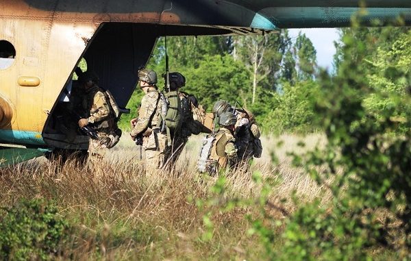 Black Swan 19 SOF on helicopter