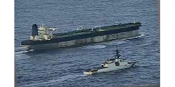 US Coast Guard Cutter and Bella 1 Oil Tanker