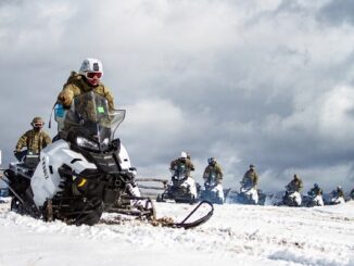 10th SFG on Snowmobiles