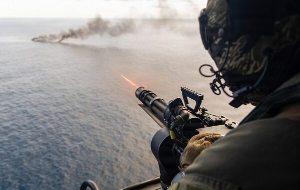 USMC UH-1Y Crew Chief Fires Minigun
