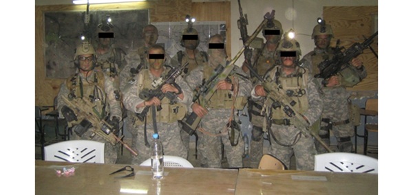 Reynaldo Baveira with Navy SEALs